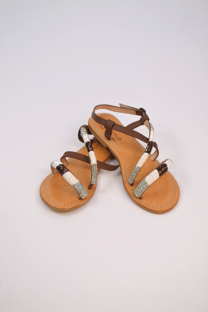 Pair of Rayas Strap Flat Sandals