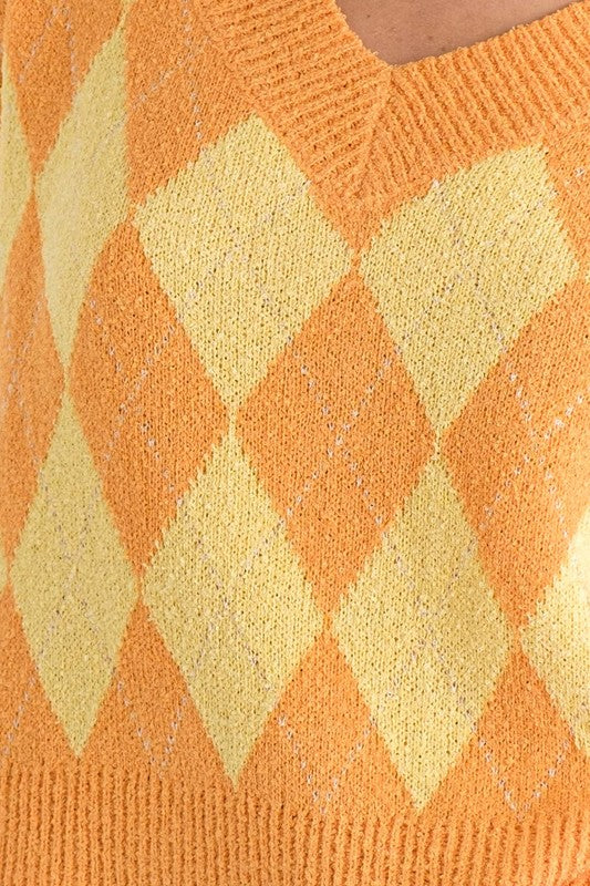 close up of Orange Triangle Sweater material