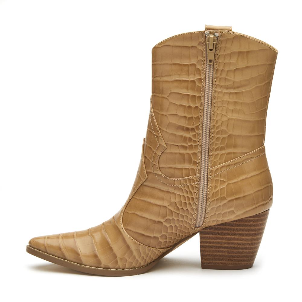 zipper side of natural color western boot