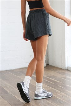 Model wearing Dark Teal High Waisted Woven Shorts