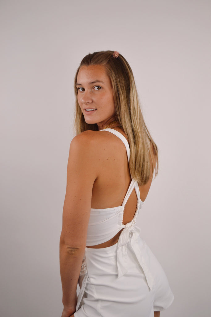 Side View - Off White Short Romper with Cross Back Detail