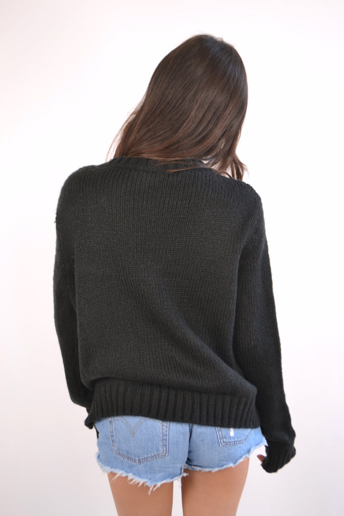 Back view of black sweater