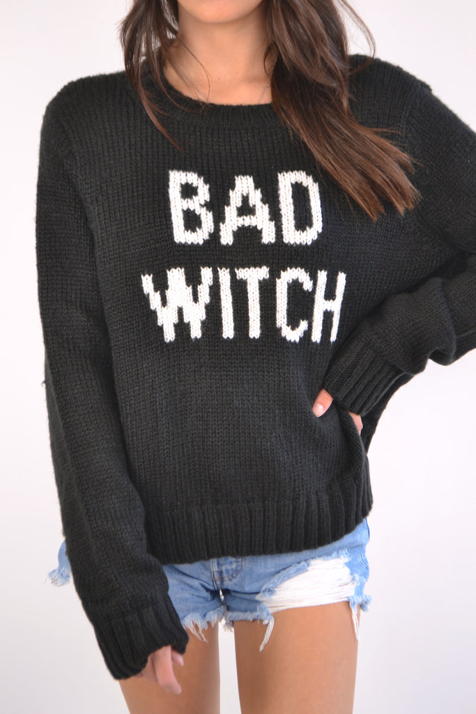 Front view of sweater with words - Bad Witch